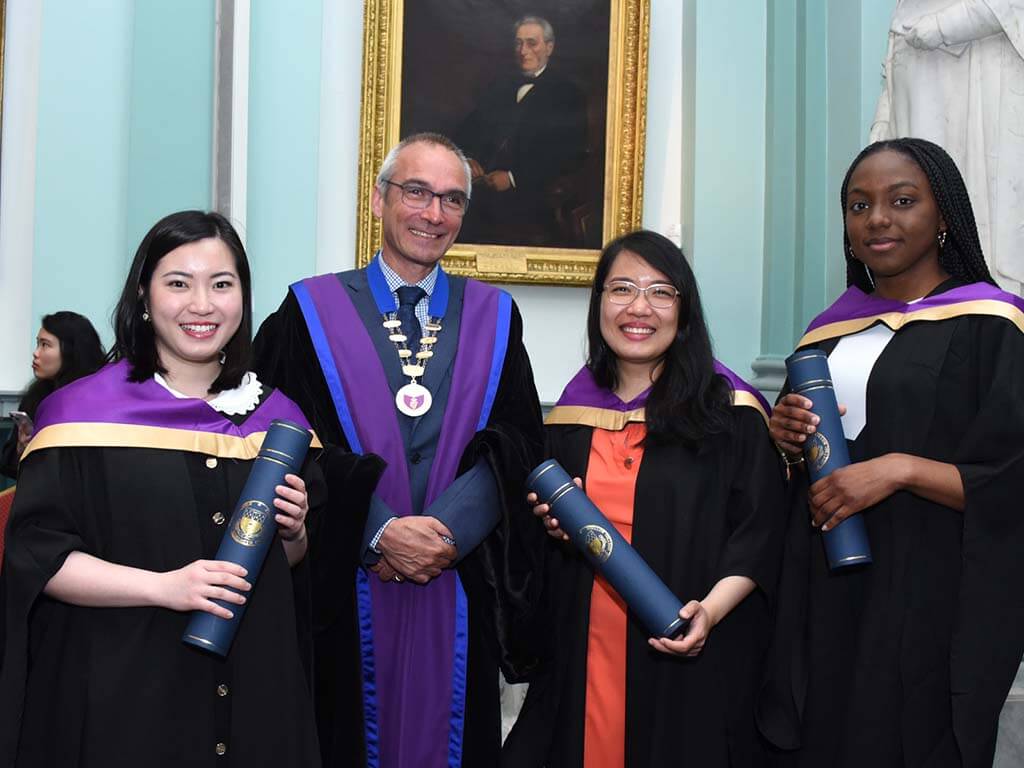 Newly conferred graduates of the Insitute of Medicine